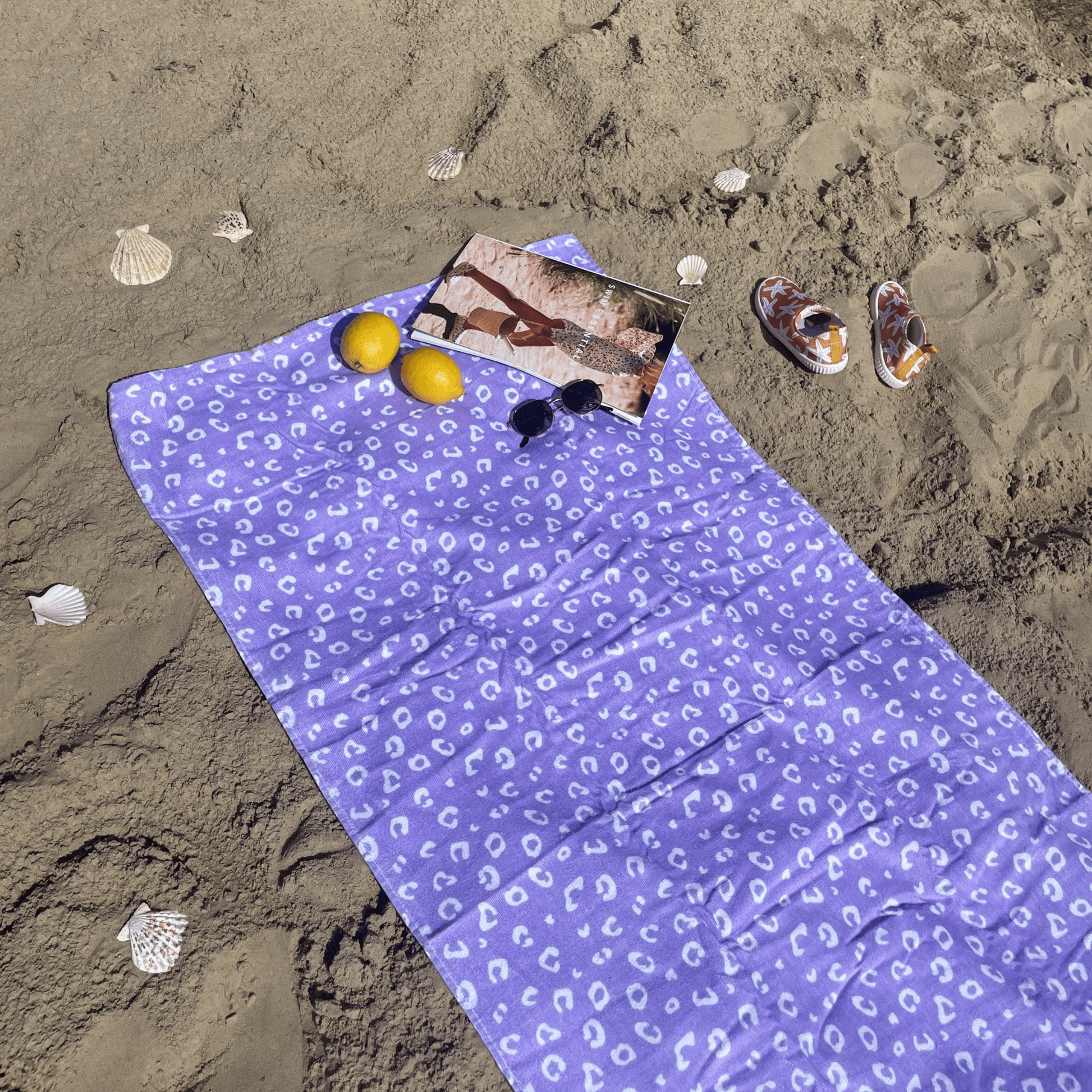 asciugamano-cotone-lilla-stampa-panter-135x65-cm-swim-essentials-3